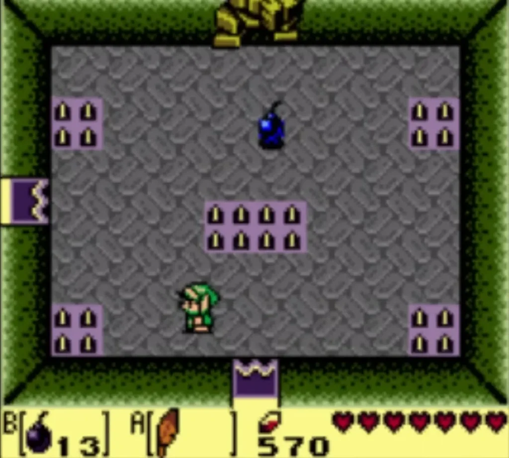 Stone Hinox at the top edge of the room, a bomb on the floor and Link at the lower left Stone Hinox at the top edge of the room, a bomb on the floor and Link at the lower left