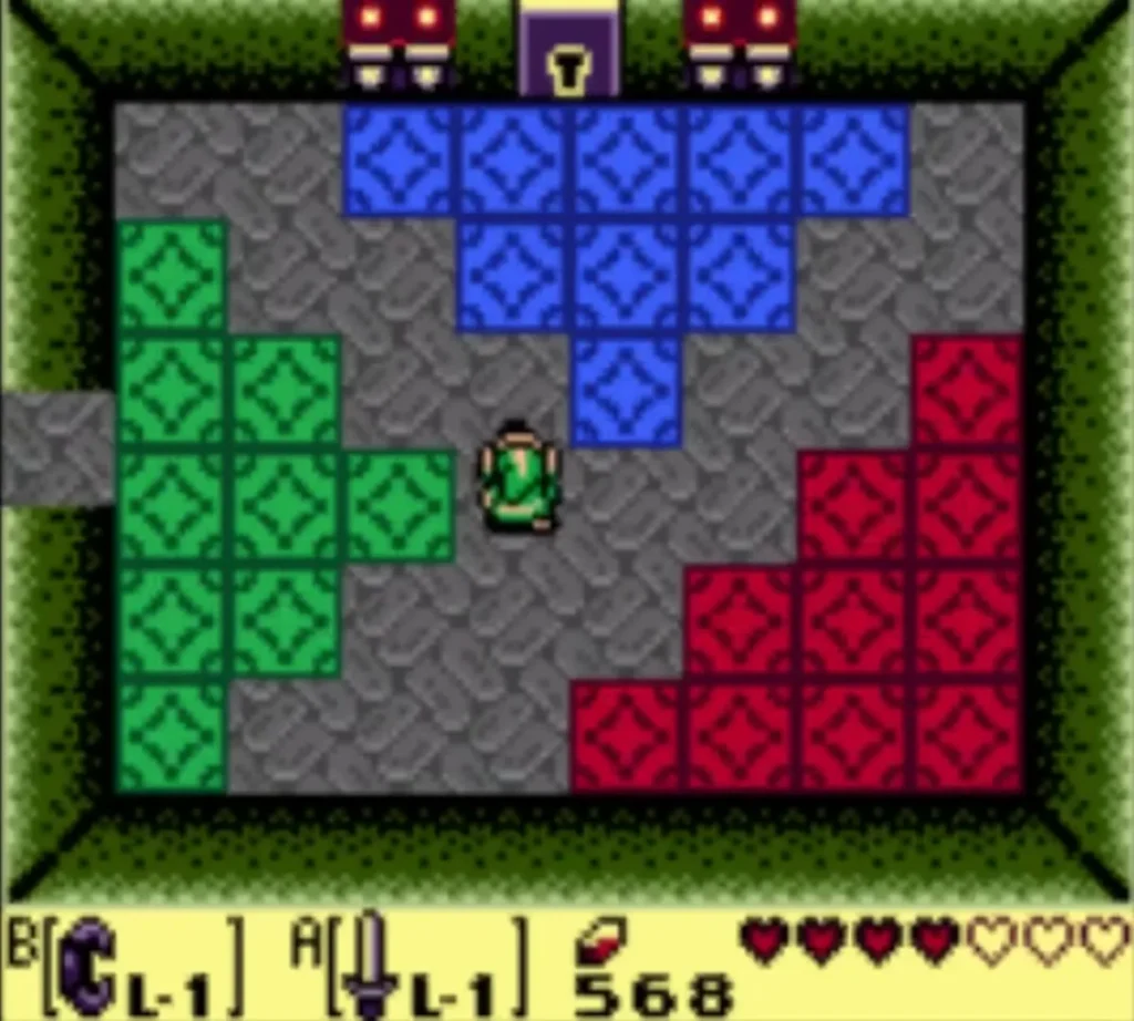 Link stands at the edge of the green tiles, away from the red ones Link stands at the edge of the green tiles, away from the red ones
