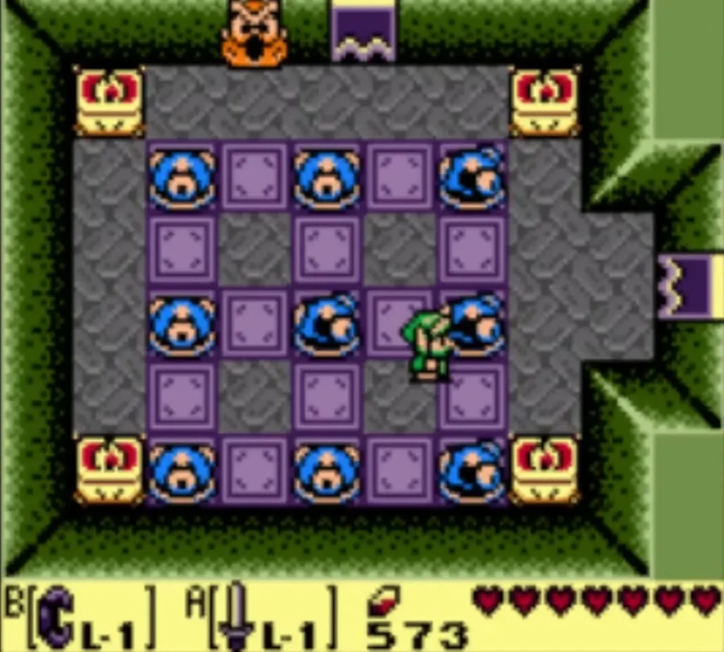 Every statue in the puzzle room is blue now, with Link standing at the right edge Every statue in the puzzle room is blue now, with Link standing at the right edge