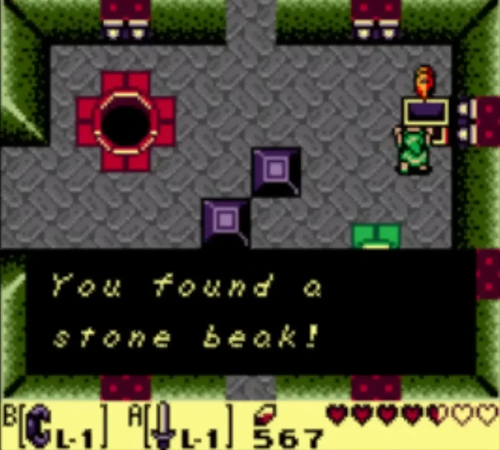 Link holds up the Stone Beak with the You found a Stone Beak message fully shown Link holds up the Stone Beak with the You found a Stone Beak message fully shown