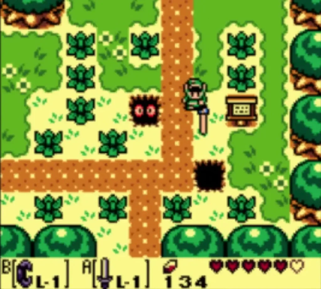 Red eyes glowing in a ground hole beside the dirt path south of Kanalet Castle as Link passes with his Sword Red eyes glowing in a ground hole beside the dirt path south of Kanalet Castle as Link passes with his Sword