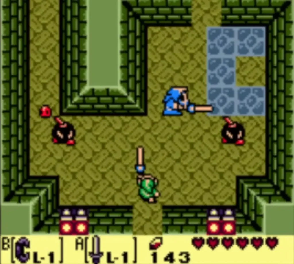 A blue Stalfos stands among black Bombites in a Key Cavern room with Link's Sword out A blue Stalfos stands among black Bombites in a Key Cavern room with Link's Sword out
