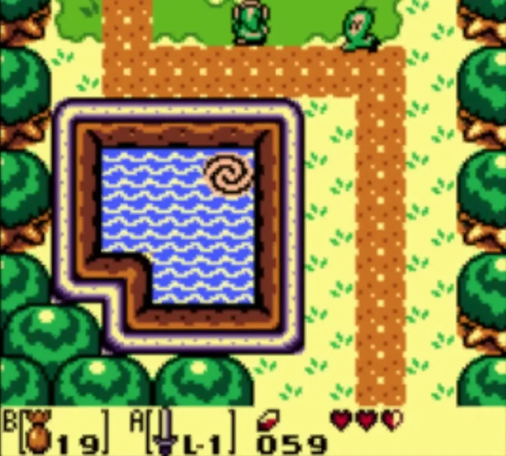 Buzz Blob near the bend of the dirt path beside the pond as Link comes up behind Buzz Blob near the bend of the dirt path beside the pond as Link comes up behind