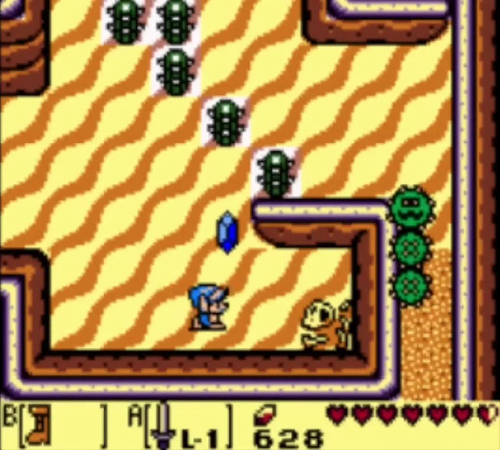 A green three-segment Pokey on the Yarna Desert sand, with Link in the lower middle A green three-segment Pokey on the Yarna Desert sand, with Link in the lower middle