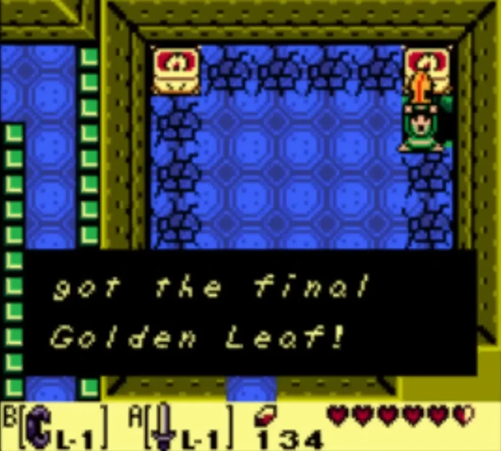 Link raises the Golden Leaf under a message box reading that he got the final Golden Leaf Link raises the Golden Leaf under a message box reading that he got the final Golden Leaf