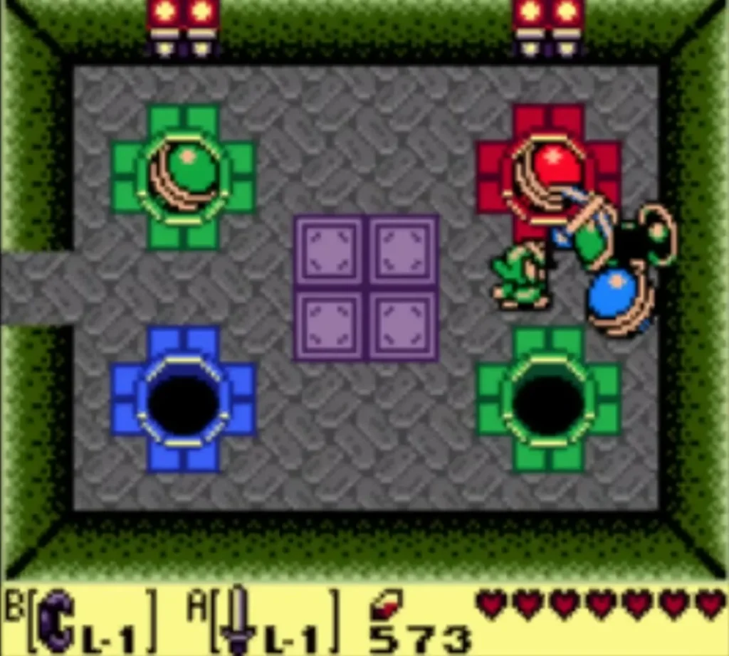 A Blue Orb Monster on an orange tile of the Color Dungeon, with Link at the bottom edge A Blue Orb Monster on an orange tile of the Color Dungeon, with Link at the bottom edge