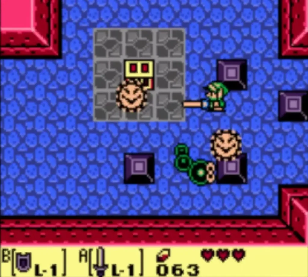 Link slashing at a Mini-Moldorm in a blue-tiled room of Tail Cave Link slashing at a Mini-Moldorm in a blue-tiled room of Tail Cave