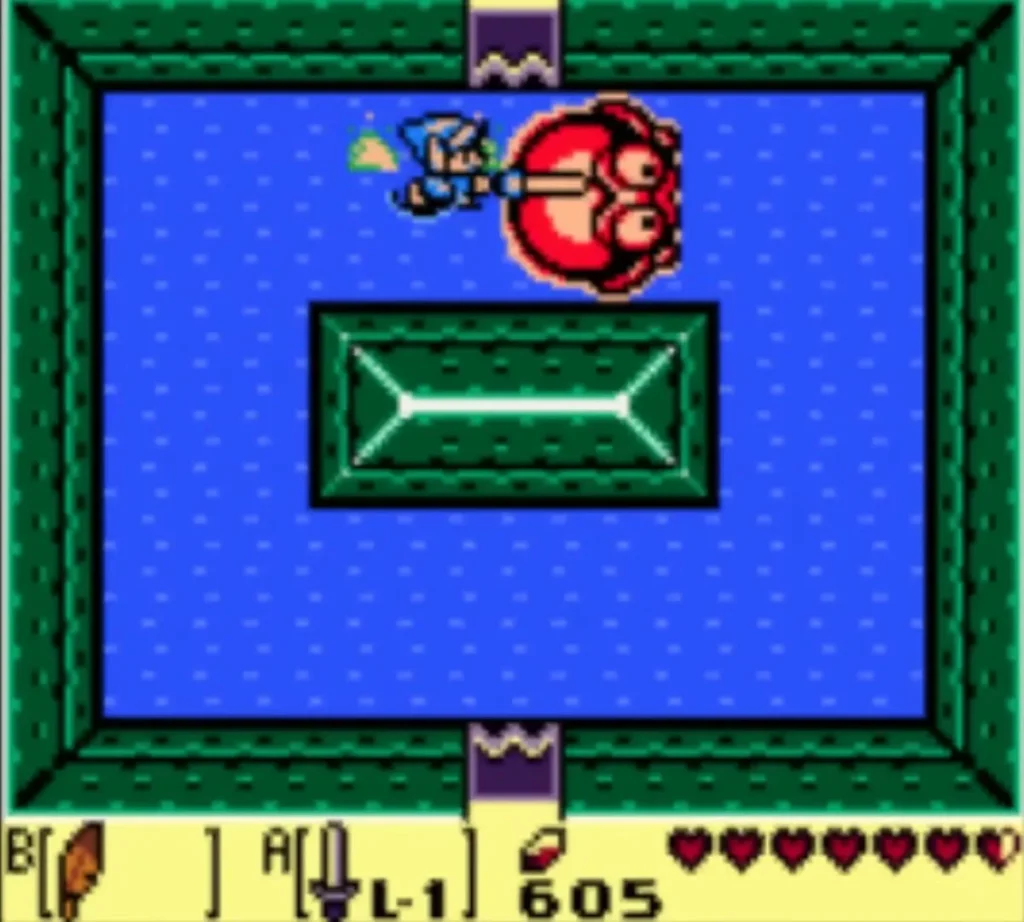 Link striking the Angler Fish head in an underwater room with a sword Link striking the Angler Fish head in an underwater room with a sword