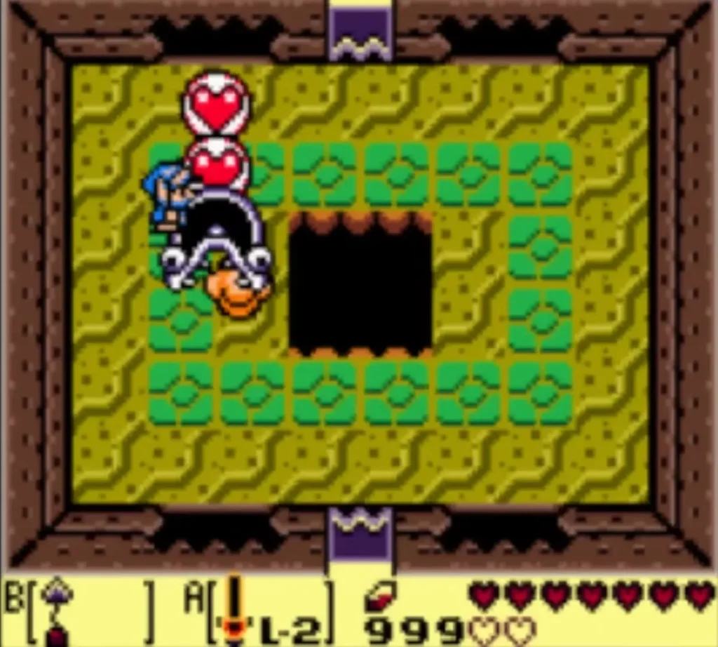 Slime Eel beside Link in Catfish's Maw with heart pickups floating above it Slime Eel beside Link in Catfish's Maw with heart pickups floating above it