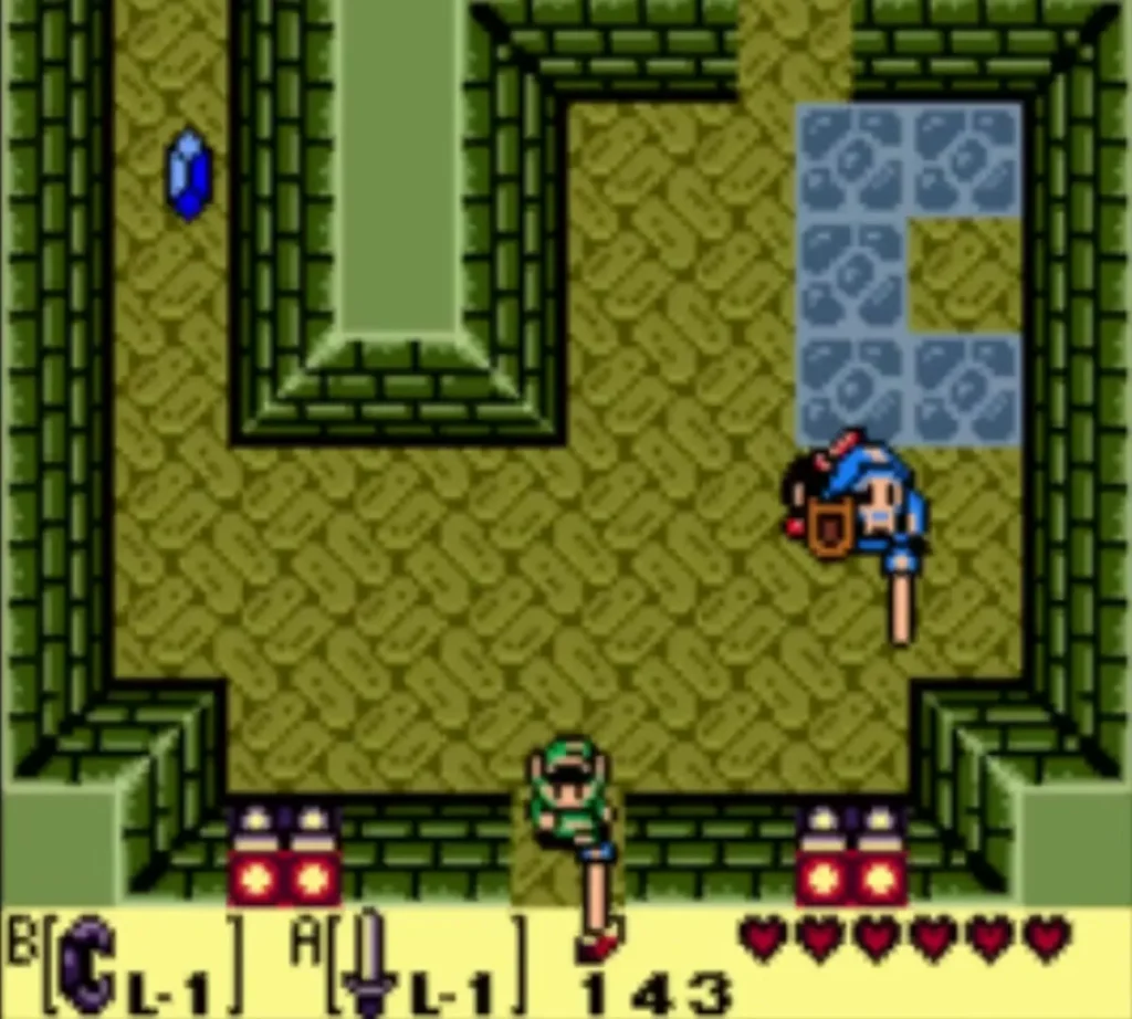 The Sword Stalfos turns with its shield raised and sword pointing down in the Key Cavern room The Sword Stalfos turns with its shield raised and sword pointing down in the Key Cavern room