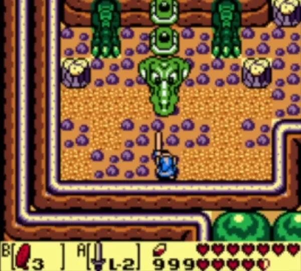 The stone turtle head lunges down at Link at the entrance to Turtle Rock The stone turtle head lunges down at Link at the entrance to Turtle Rock