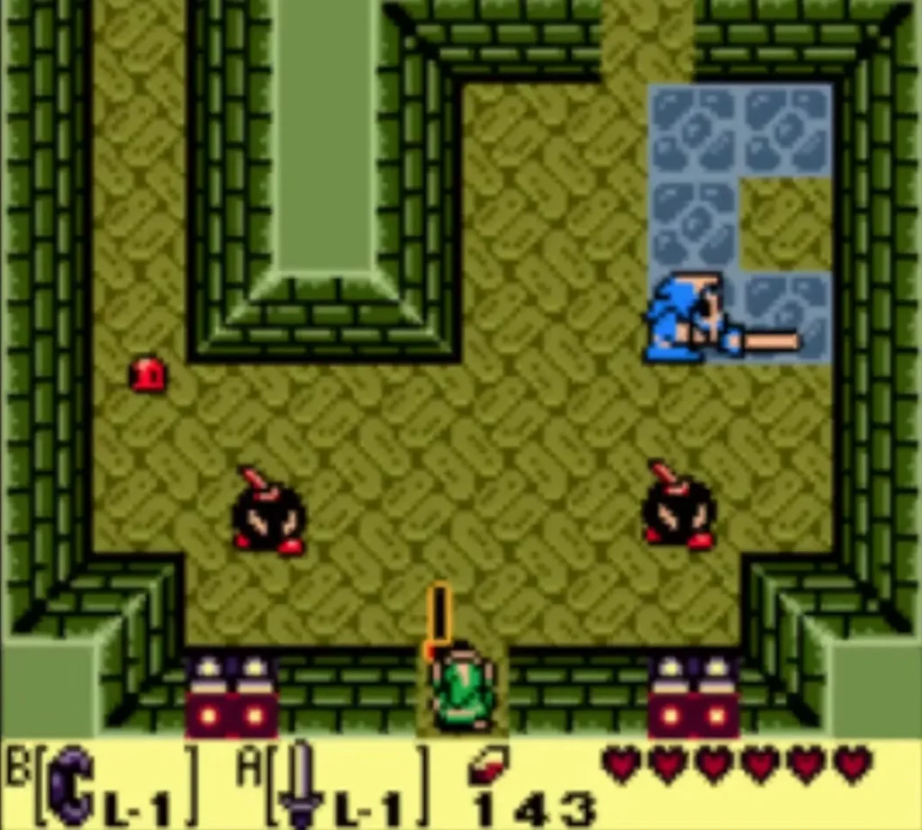 Two Bombites with lit fuses closing in on Link in the Key Cavern Two Bombites with lit fuses closing in on Link in the Key Cavern