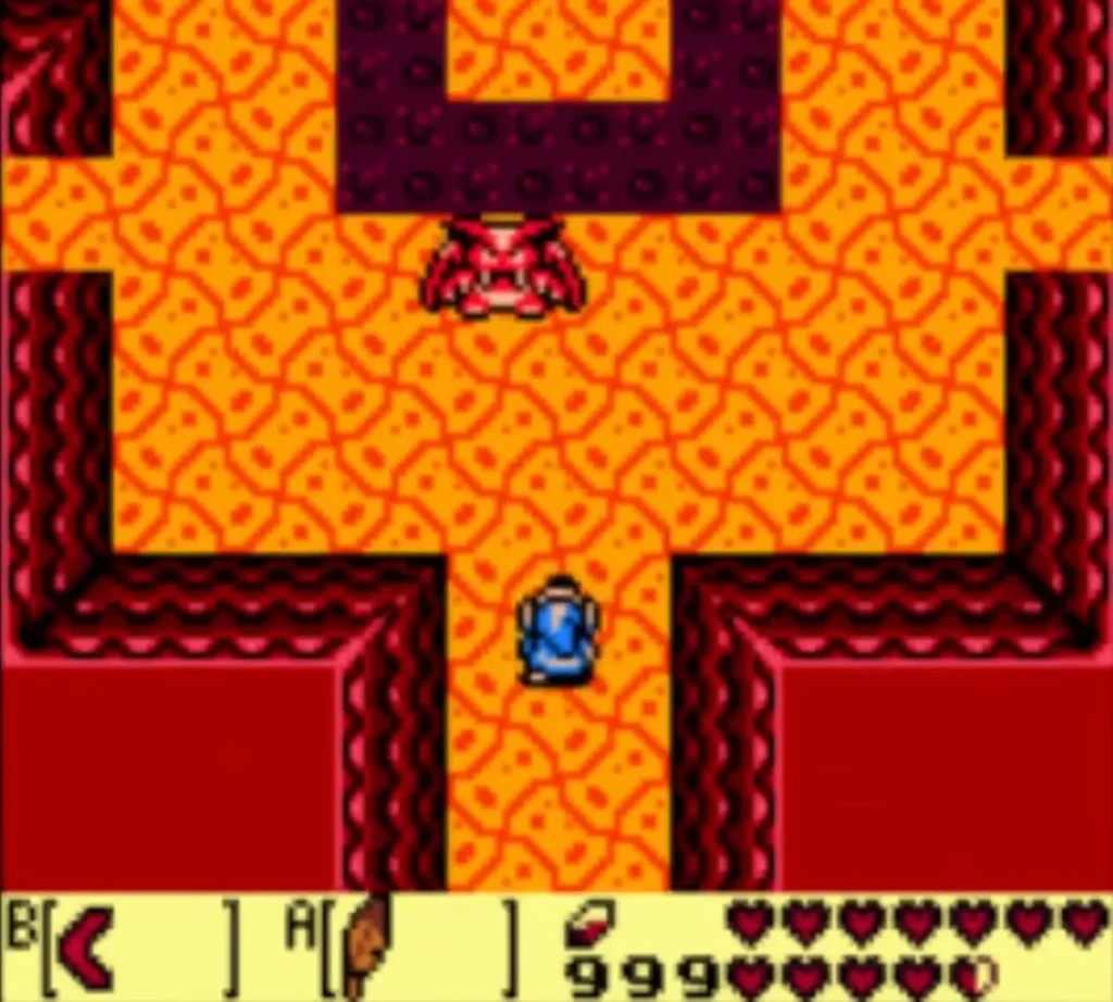 A red Vire hovering over the dark floor of a lava passage in Turtle Rock as Link stands below A red Vire hovering over the dark floor of a lava passage in Turtle Rock as Link stands below