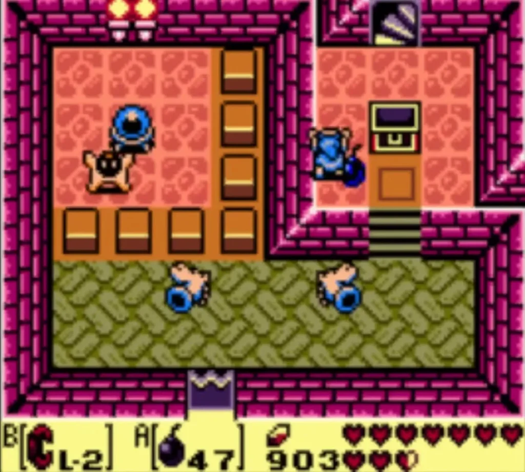 An orange Wizzrobe beside a blue eye statue as Link stands at the edge of a chest ledge in the Face Shrine An orange Wizzrobe beside a blue eye statue as Link stands at the edge of a chest ledge in the Face Shrine