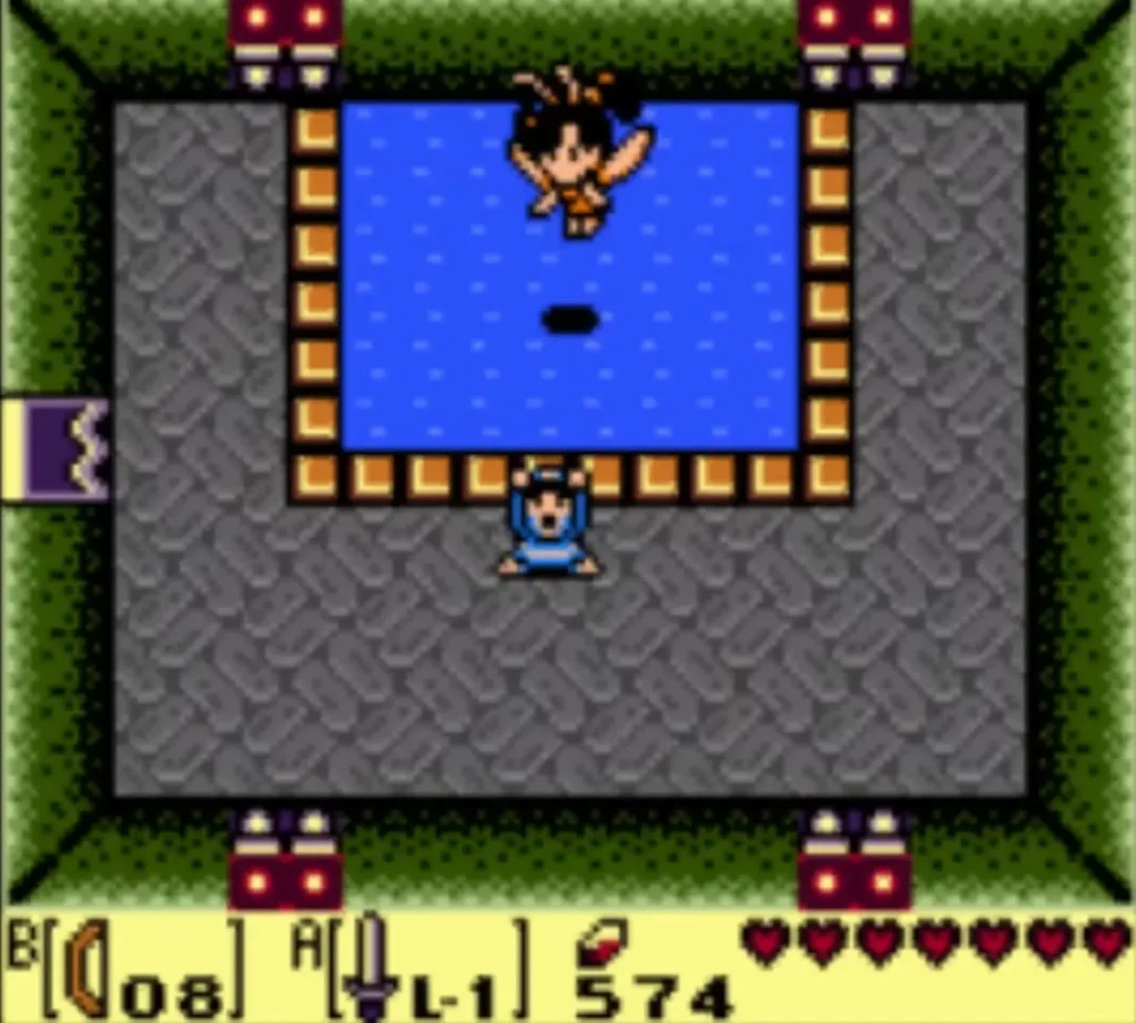 Link in the Blue Tunic at the edge of the Great Fairy's pool with the fairy above him Link in the Blue Tunic at the edge of the Great Fairy's pool with the fairy above him