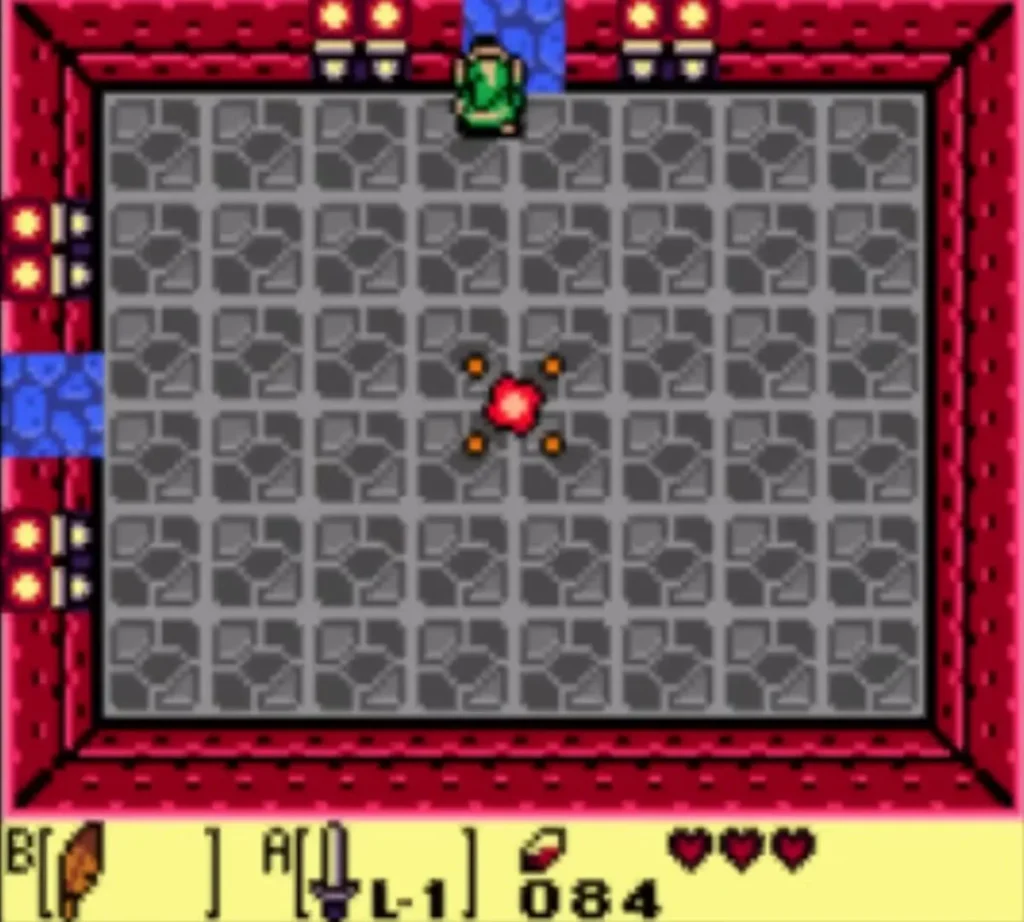 A red fairy burst glows in the middle of the grey Tail Cave room after the mini-boss falls A red fairy burst glows in the middle of the grey Tail Cave room after the mini-boss falls