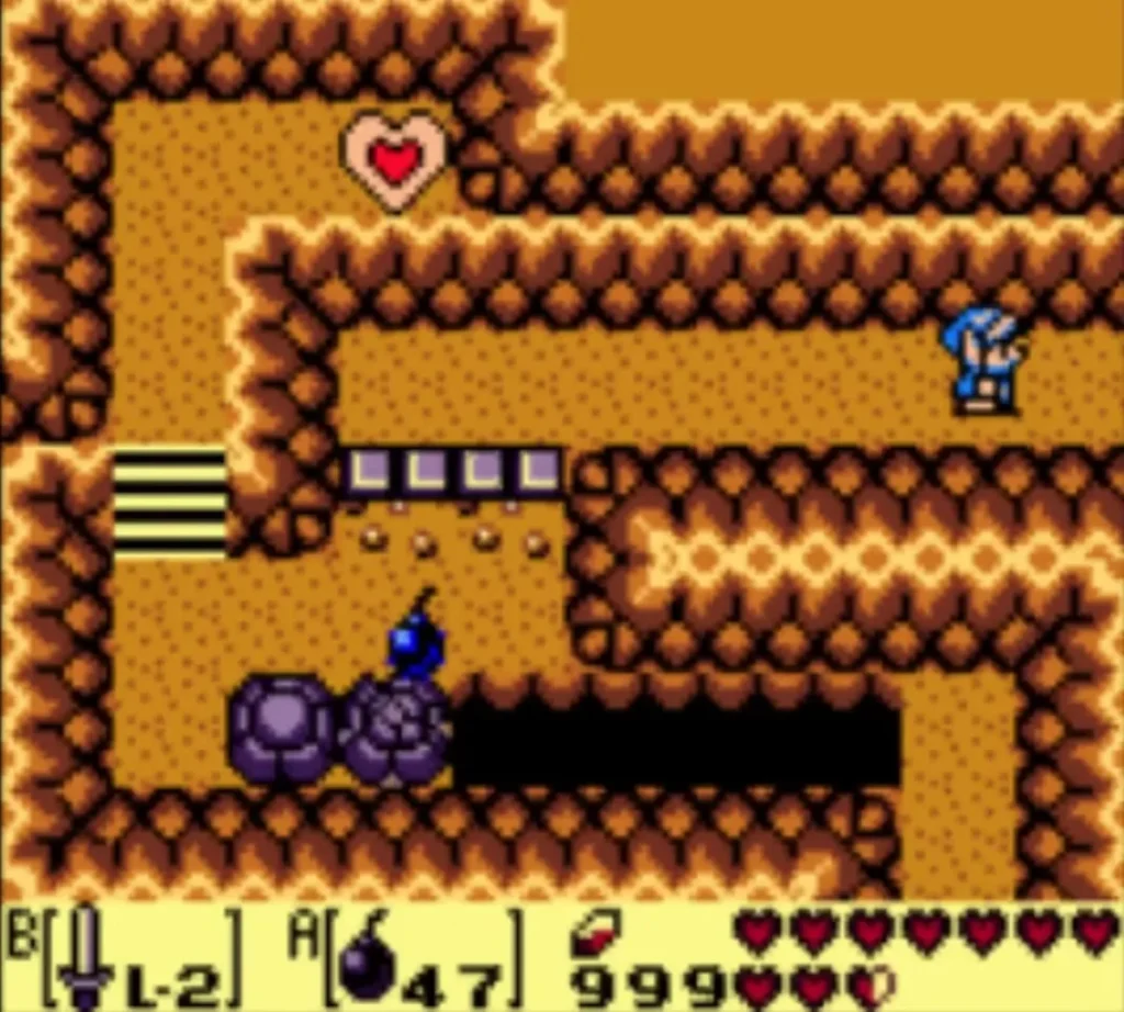 A Bomb sits on the floor beside a purple block in the Animal Village cave A Bomb sits on the floor beside a purple block in the Animal Village cave