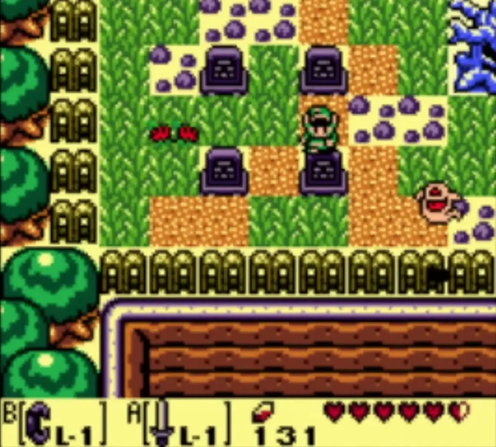 Link stands beside four graves in the cemetery, next to the lower-right gravestone. Link stands beside four graves in the cemetery, next to the lower-right gravestone.