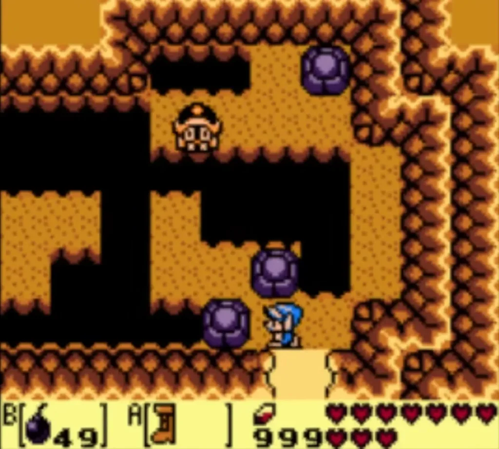 Link enters the cracked-wall cave with rocks and gaps ahead of him Link enters the cracked-wall cave with rocks and gaps ahead of him