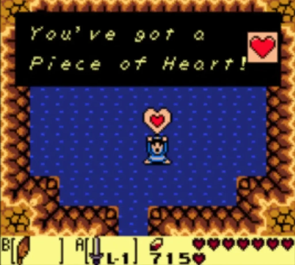 Link holds up a Piece of Heart in the flooded cave pool with the item box fully shown Link holds up a Piece of Heart in the flooded cave pool with the item box fully shown