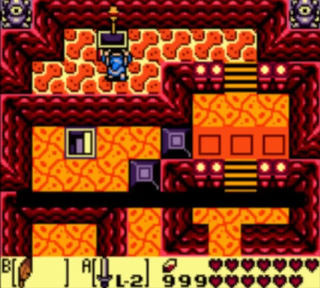 Link stands at the ledge where the Magic Rod chest sits above the lava Link stands at the ledge where the Magic Rod chest sits above the lava