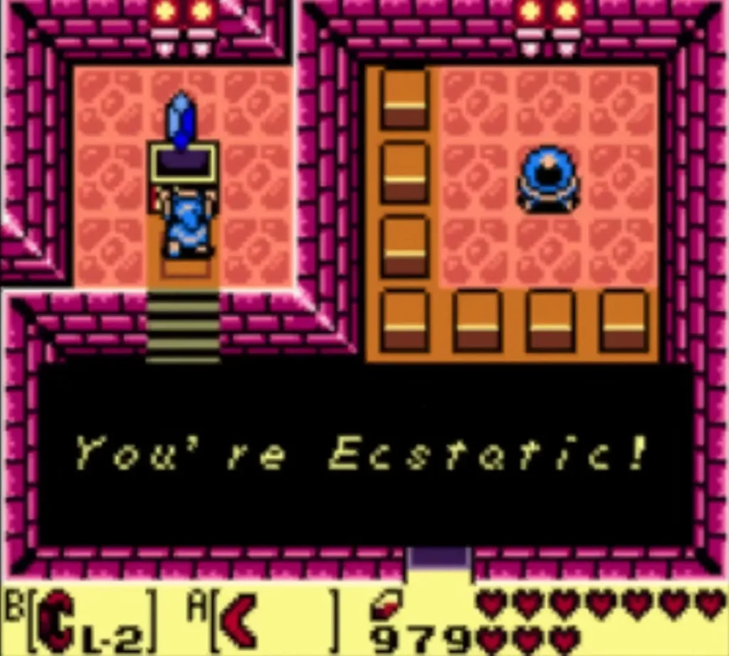 The message reading You're Ecstatic! appears as Link holds a blue crystal overhead The message reading You're Ecstatic! appears as Link holds a blue crystal overhead