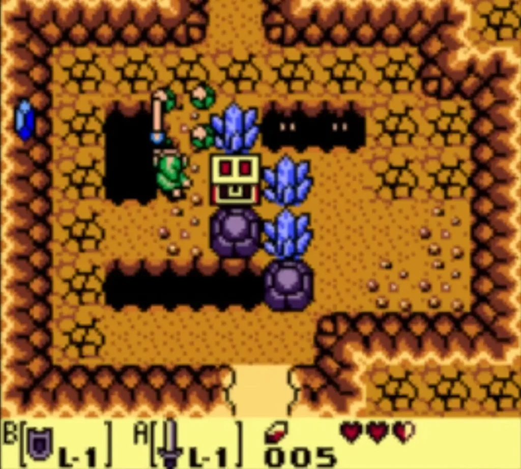 Link beside blue crystals and a yellow face block with red eyes in the forest log cave Link beside blue crystals and a yellow face block with red eyes in the forest log cave