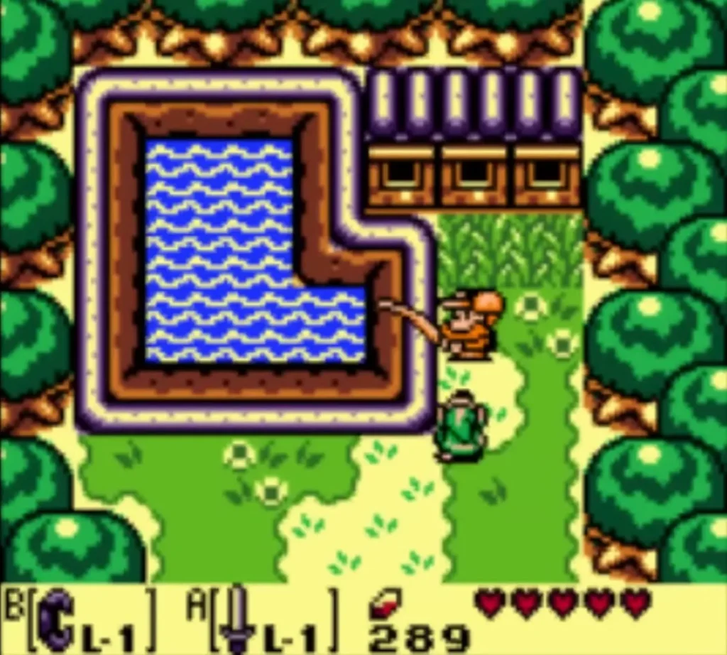 Link beside the pond in north Mabe Village as the fisherman casts his line