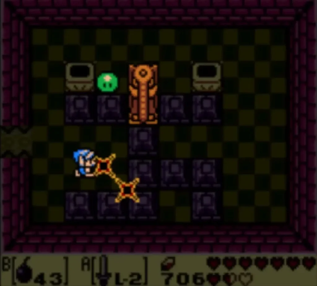 Link facing a red Spark in the dark dungeon room of the Face Shrine