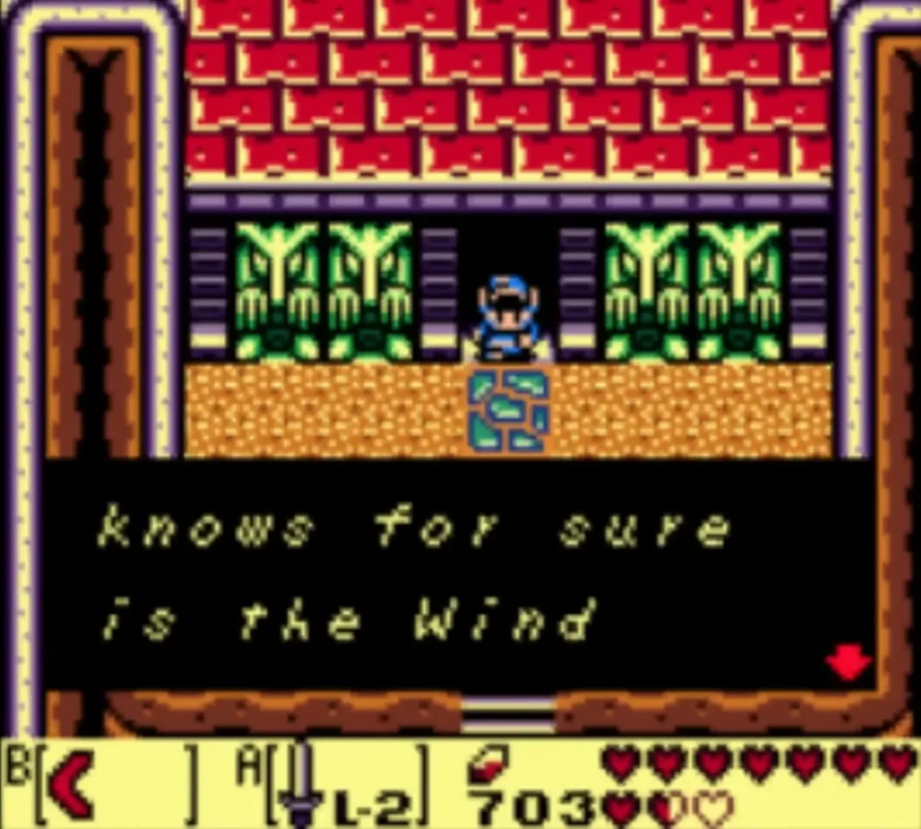 Owl message about the Wind Fish in the ruins, with Link standing between two plant statues