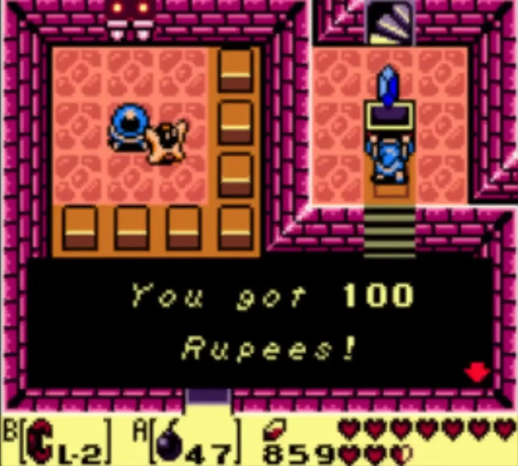 Link holds up a blue crystal with the You got 100 Rupees box on screen
