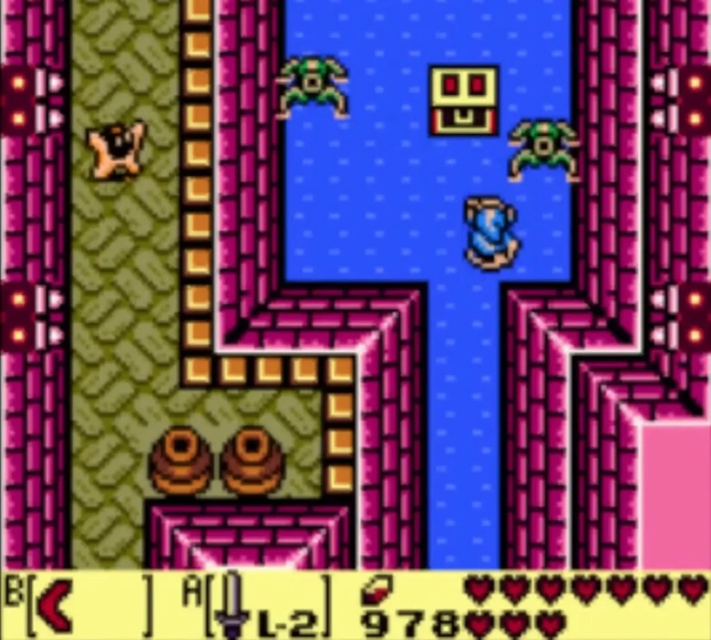 Link wades through a water channel with two green enemies nearby