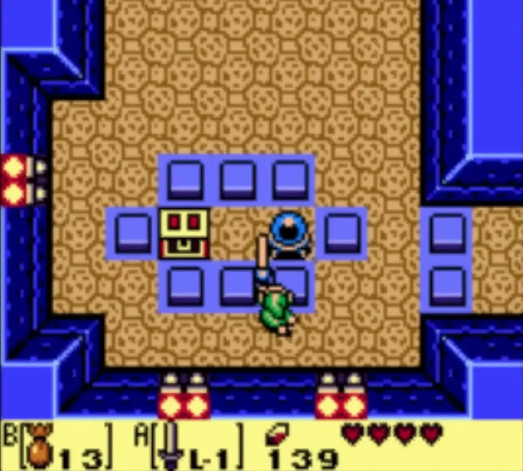 Link striking the crystal switch among the raised blue blocks in Bottle Grotto Link striking the crystal switch among the raised blue blocks in Bottle Grotto