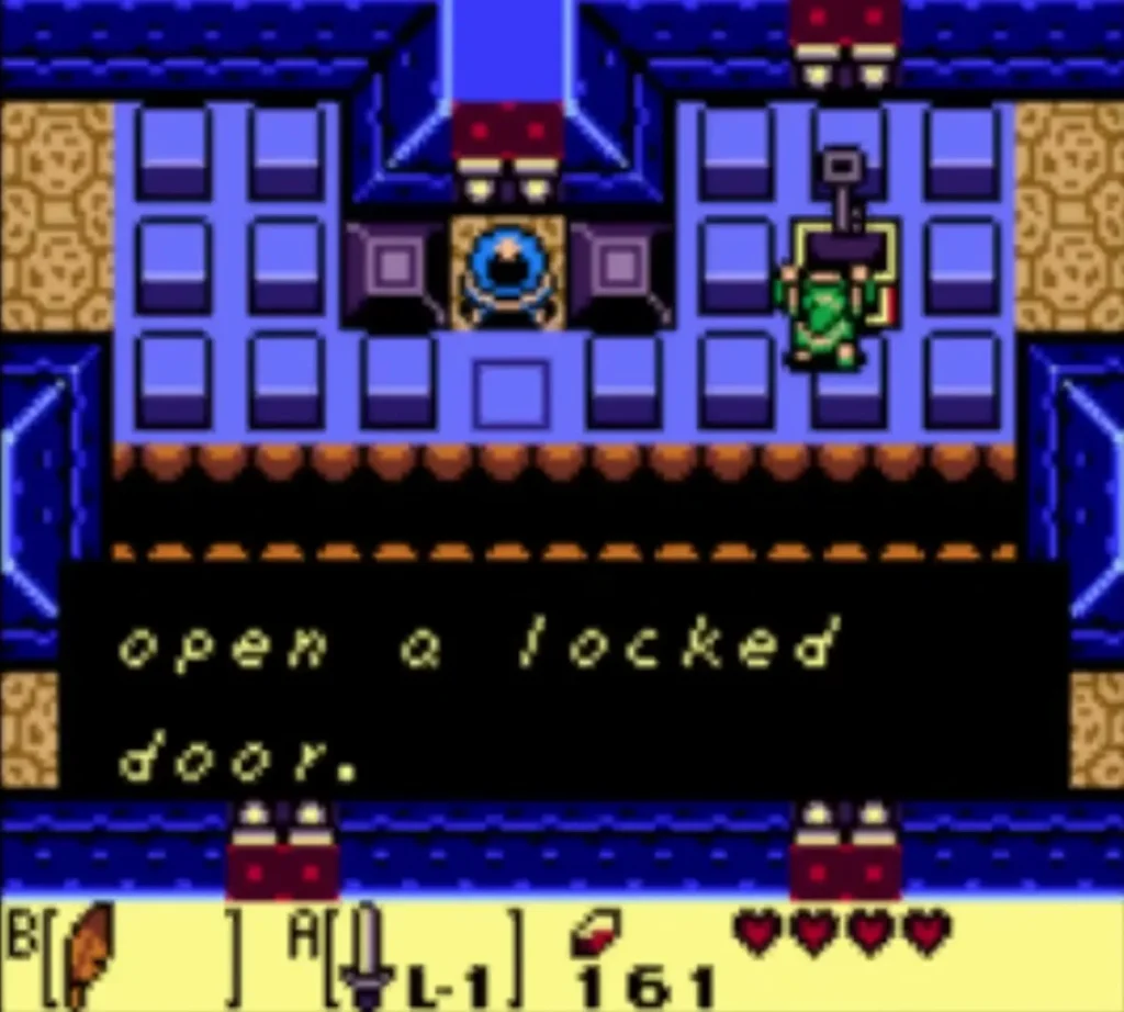 Link holds the small key overhead; the message box ends with open a locked door. Link holds the small key overhead; the message box ends with open a locked door.