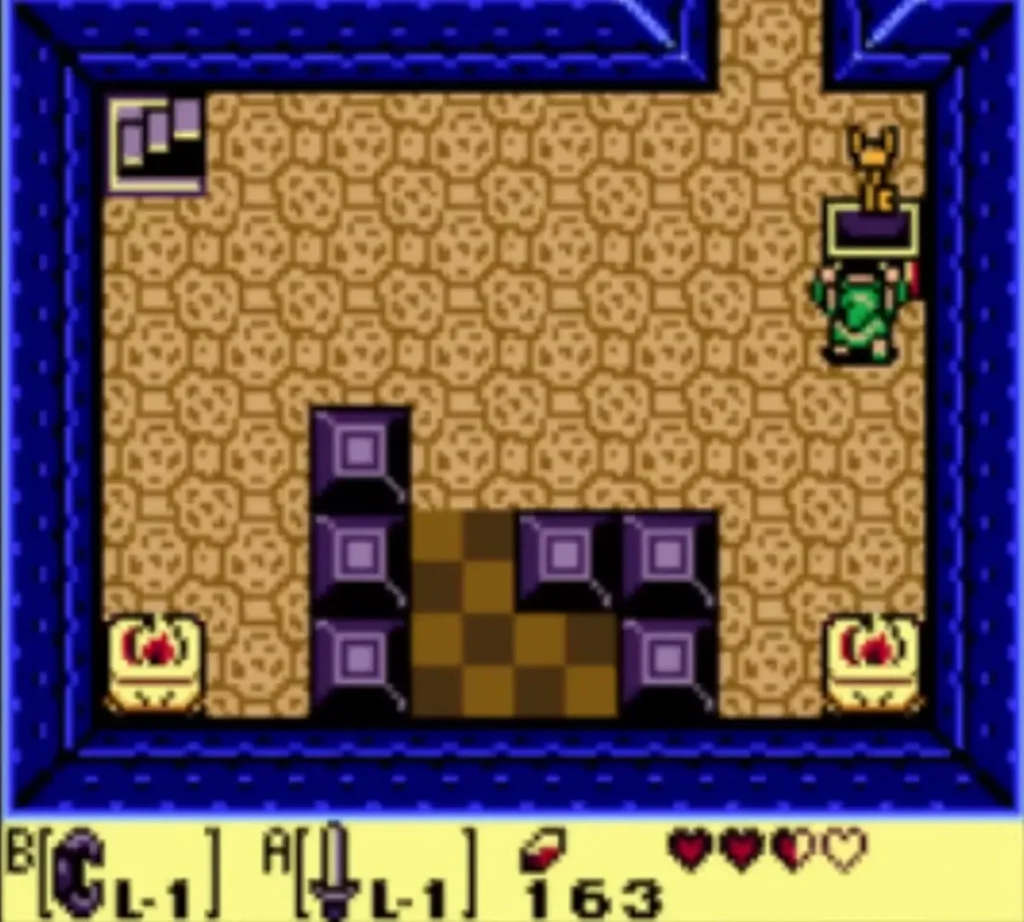 Link holds the Nightmare Key up above a chest in a room of purple blocks Link holds the Nightmare Key up above a chest in a room of purple blocks