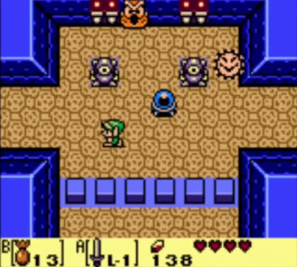 Link in the sandy room with the purple figures and the blue crystal near the south blue blocks Link in the sandy room with the purple figures and the blue crystal near the south blue blocks