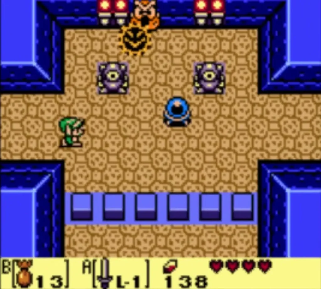 Link in a sandy Bottle Grotto room with two purple figures and a blue crystal switch Link in a sandy Bottle Grotto room with two purple figures and a blue crystal switch