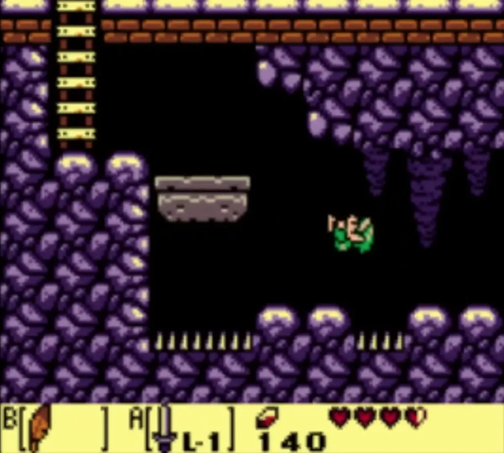 Link in the purple underground cavern beside a grey stone platform, with spikes on the floor below Link in the purple underground cavern beside a grey stone platform, with spikes on the floor below