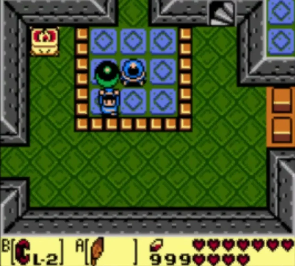 Link lifts the iron ball beside the crystal switch ringed by blue blocks Link lifts the iron ball beside the crystal switch ringed by blue blocks