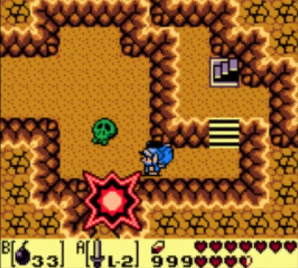 A bomb blast at a cave wall beside Link, with a green skull enemy nearby A bomb blast at a cave wall beside Link, with a green skull enemy nearby
