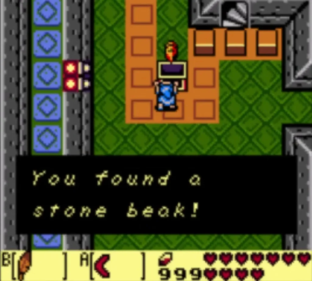 The message box 'You found a stone beak!' beside the chest The message box 'You found a stone beak!' beside the chest