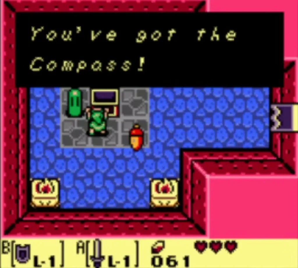 A message box reading You've got the Compass! is fully typed beside the chest in the Tail Cave room A message box reading You've got the Compass! is fully typed beside the chest in the Tail Cave room