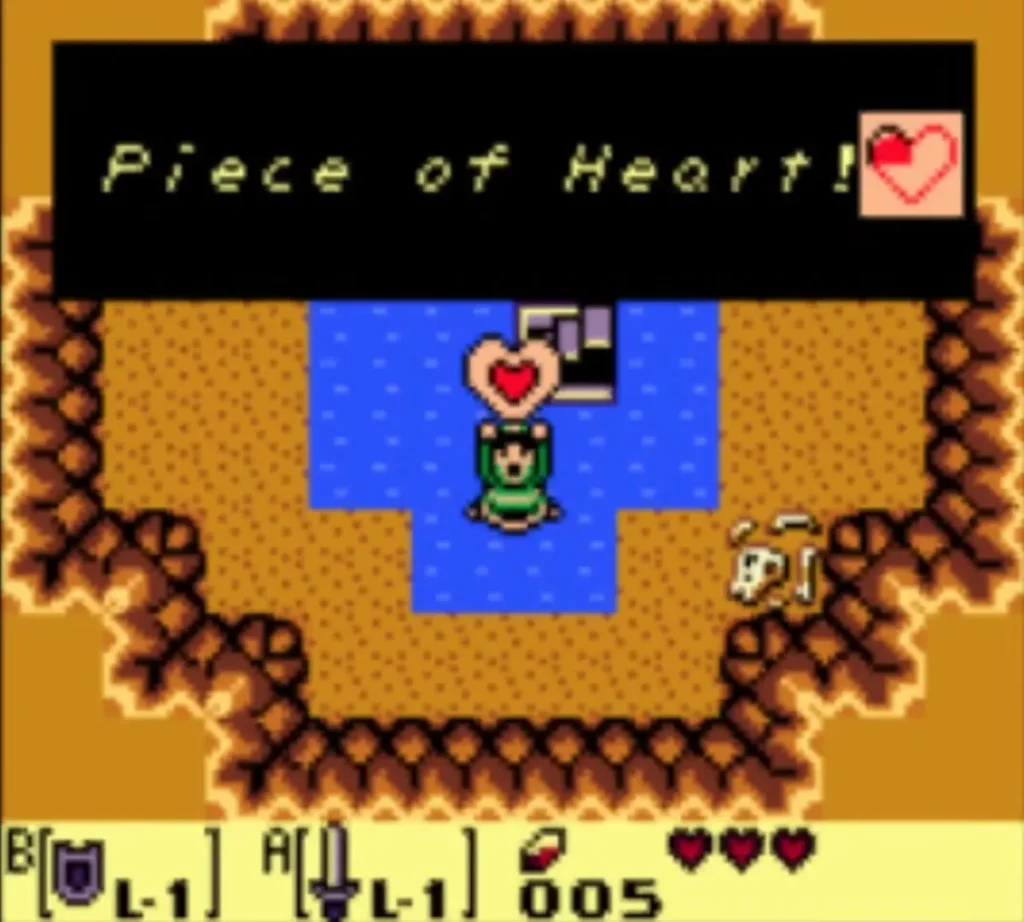 Piece of Heart! box fully typed as Link stands below the heart in a rock-ringed pool Piece of Heart! box fully typed as Link stands below the heart in a rock-ringed pool