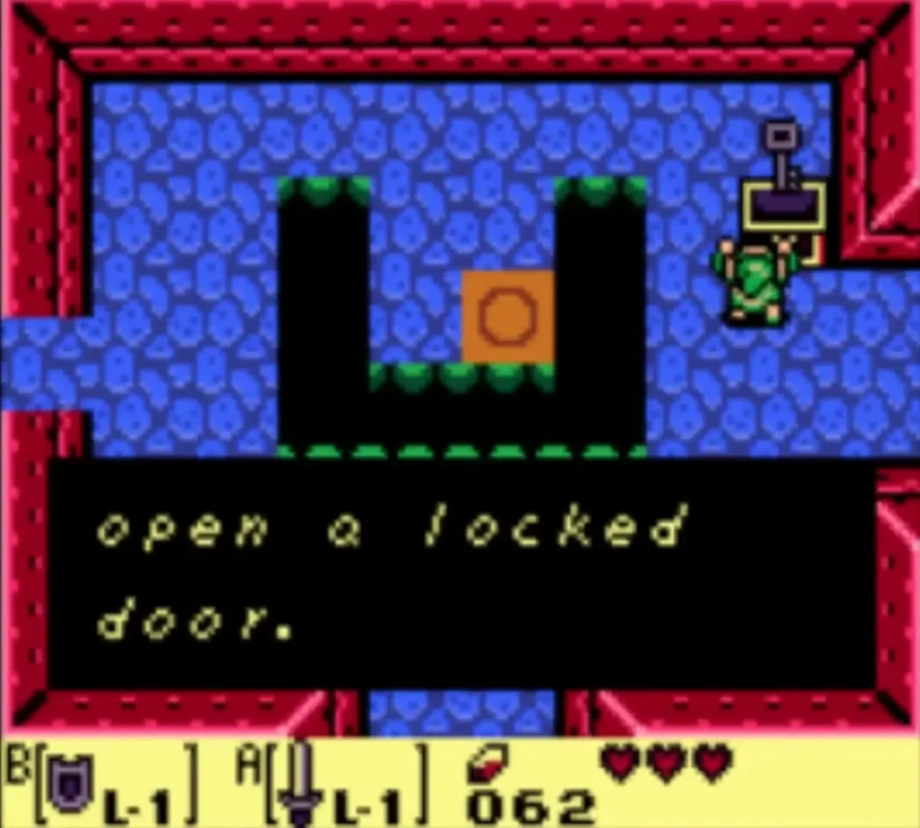 A message box ending with open a locked door is fully typed beside the chest in the pit room A message box ending with open a locked door is fully typed beside the chest in the pit room