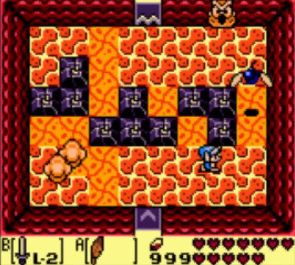 Link in the lava block room as two defeated Zols vanish in orange puffs Link in the lava block room as two defeated Zols vanish in orange puffs