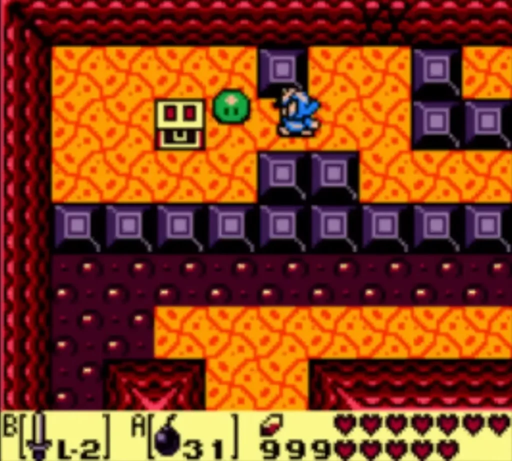 Link beside a green Zol and a stone face block in the block room Link beside a green Zol and a stone face block in the block room