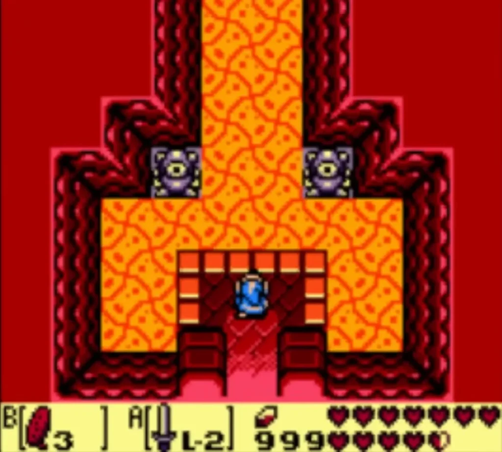 Link steps into the lava-red entrance hall of Turtle Rock beneath its two eye statues Link steps into the lava-red entrance hall of Turtle Rock beneath its two eye statues