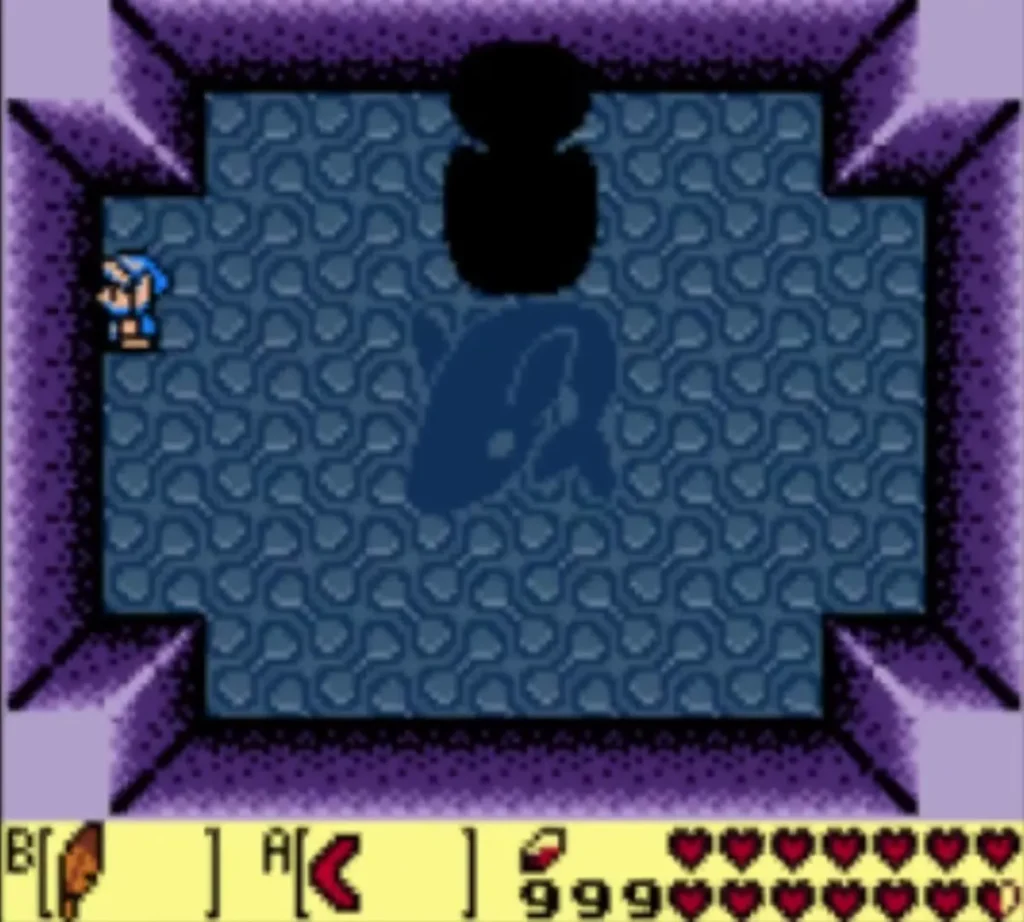 Link at the left edge of the arena as black Lanmola segments loom at the top Link at the left edge of the arena as black Lanmola segments loom at the top