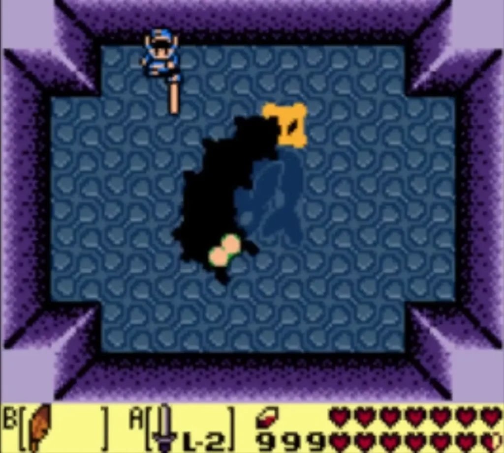 Link at the top of the arena with his sword pointing down toward the dark Moldorm worm Link at the top of the arena with his sword pointing down toward the dark Moldorm worm