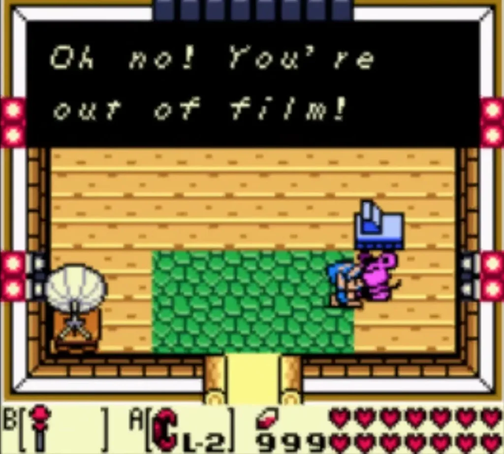The photographer mouse says Link is out of film, with the message box fully shown The photographer mouse says Link is out of film, with the message box fully shown